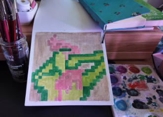 photo of pixel watercolor sketchbook on page 11, a pixel figure drawing of a the back view of a woman with green skin and pink hair